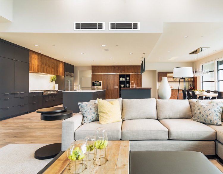 Discreet bulkhead unit conditioning a lounge room